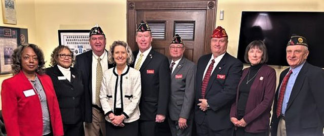 An American Legion delegation visited the Office of Congresswoman Jen Kiggans (R), Virginia 2nd District, on February 28, 2023 in Washington, D.C.  The purpose of the Congressional visit was to review the 2023 American Legion legislative agenda with Congresswoman Kiggans.  Her role on the Veterans Affairs Committee, as Chairperson of the Oversight and Investigations Subcommittee, plays a key role in ensuring any legislation passed actually gets implemented by the Veterans Administration.  In the photo (left to right) are: Pam Elam-Lipscomb, President, Auxiliary, Department of Virginia; Ethel Carson, Auxiliary; Frederic Kinkin, Commander, American Legion, Department of Virginia, 2nd District; Congresswoman Kiggans; Brett Reistad, Past National Commander; Dan Dellinger, Past National Commander; Linden Dixon, National Executive Committee, Department of Virginia; Margaret Dellinger, Auxiliary; and Bill Aramony, Legislative Coordinator, Department of Virginia.  It is noteworthy to mention that Congresswoman Kiggans is a legionnaire of the SSgt. Robert C. Melberg, U.S. Army, American Legion Post 110 of Virginia Beach, VA.  Photograph courtesy of Congresswoman Kiggans' Office Staff. 