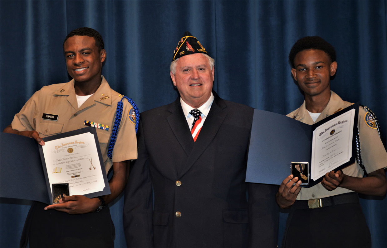 SSgt Robert C. Melberg, USA, American Legion Post 110 of Virginia Beach, VA presented American Legion NJROTC Excellence Awards to two cadets at Landstown High School on March 17, 2023.  Presenting the awards was Post Adjutant Ron Basso.  The awardees were (left) Cadet PO3 Marlon Harris for his 