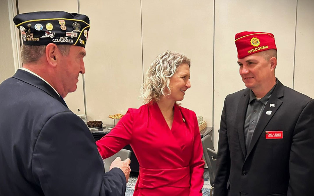 Legionnaires Jenn Kiggans (center) and Fred Kinkin, Post Adjutant, (left) of the SSgt Robert C. Melberg, USA, American Legion Post 110 of Virginia Beach, VA talked with American Legion National Commander Daniel J. Seehafer (right) at the recent Virginia Department's Spring Conference.  Kiggans is also a Congresswoman for Virginia's Second District and a retired Navy Veteran.  They discussed future legislation that will provide services to our Nation's military veterans.  Photography by Dave Wallace, Historian, American Legion, Virginia Department