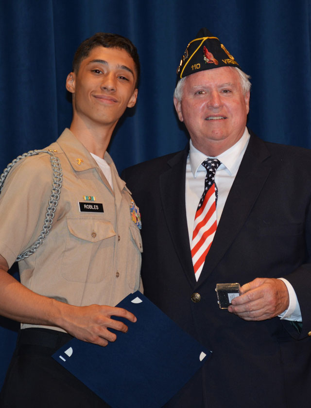 The SSgt Robert C. Melberg, USA, American Legion Post 110 of Virginia Beach, VA presented NJROTC Awards to two cadets from Landstown High School at a ceremony held on May 8, 2024.  Post Commander Ron Basso presented the award for 'Top Scholar'  to Cadet Raymond Robles who also received a 'Certificate of Special Congressional Recognition' and a 'Letter of Commendation' from Congresswoman Jen A. Kiggans, Virginia's Second District.  (Photography by Bert Wendell, Jr.)
