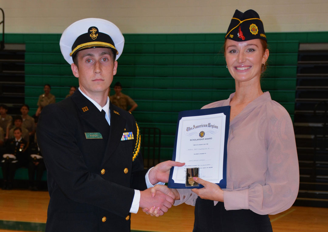 Legionnaire Emily Wolf presented the 'Scholarship Award' to Cadet Brodie Rapine. (Photography by Bert Wendell, Jr.)