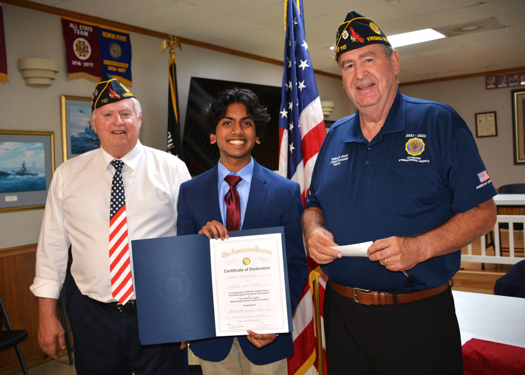 The SSgt Robert C. Melberg, U.S. Army, American Legion Post 110 of Virginia Beach, VA held an Oratorical Contest on October 23, 2024.  Three students gave an 8 to 10 minutes oral presentation on the United States Constitution.  They were Caylee Norris, a Home Schooled student; Kenul Vantwest, Princess Anne HS student; and Aarya Rajashekara, Catholic HS student.  The winner of the very close competition was Aarya Rajashekara (center) who was presented with an American Legion Certificate of Distinction and a check for 100 dollars.  He will now move on to the 2nd District competition.  Making the presentation was Post Commander Ron Basso (left) and Post Adjutant Fred Kinkin (right).  (Photography by Bert Wendell, Jr.)