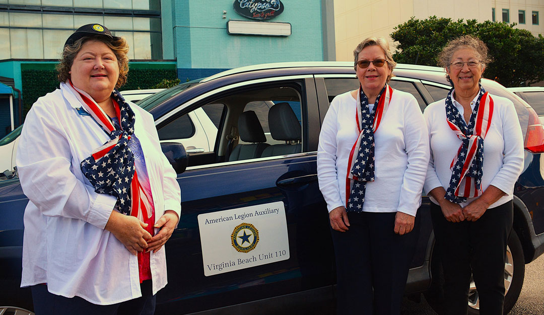 Ladies of Auxiliary Unit 110 of Virginia Beach participated in their first Veterans Day Parade on November 11, 2024 in Virginia Beach, VA.  Unit 110 is an integral part of the SSgt Robert C. Melberg, U.S. Army, American Legion Post 110 by providing support to military veterans and their families.  In the photo (L to R) are Unit President Tonya Jones, Dale Smith and Jesse Basso.  (Photography by Bert Wendell, Jr.)