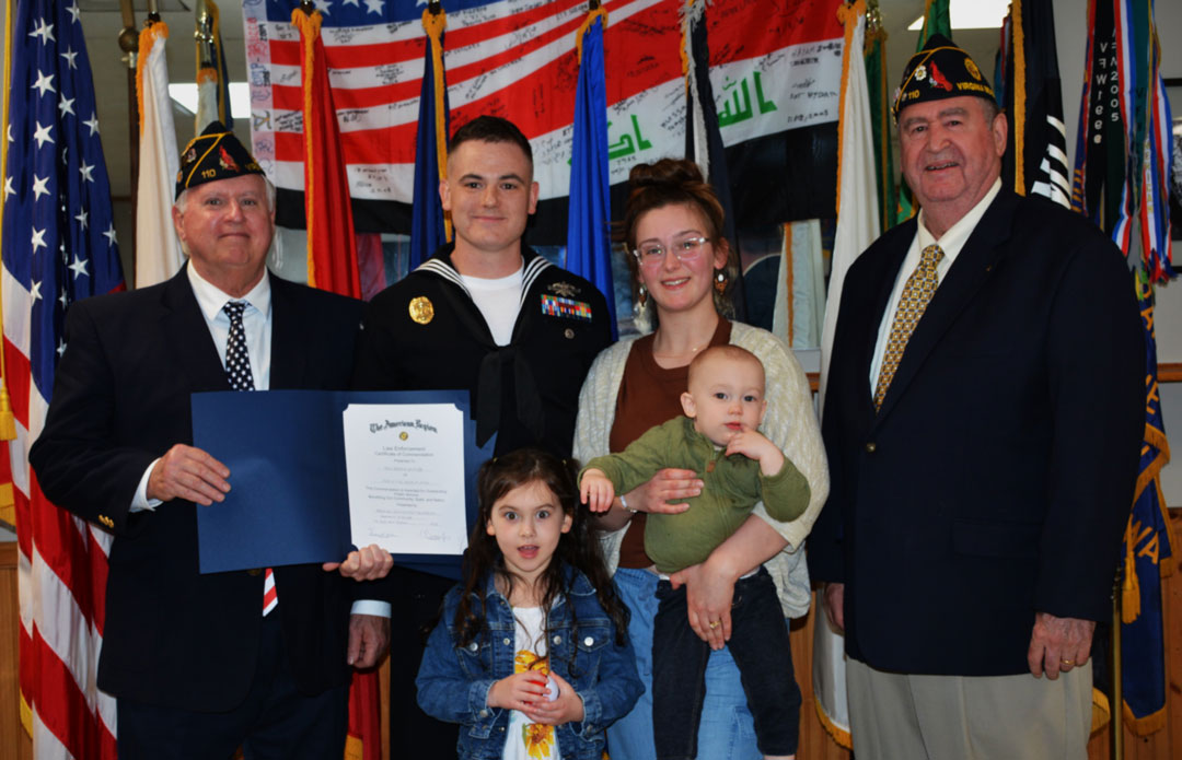 In the first photo (l to r) are Commander Basso, Petty Officer Smith, his wife Madison, daughter Ginny, son Theodore, and Adjutant Kinkin.  (Photography by Bert Wendell, Jr.)