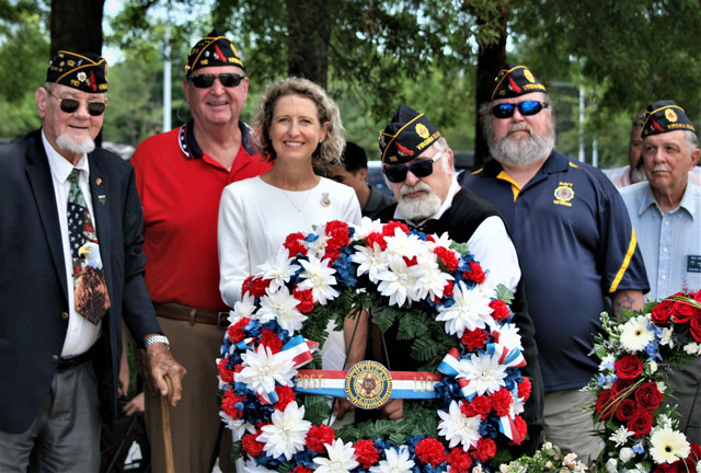 Legionnaires of SSgt Robert C. Melberg, U.S. Army, American Legion Post 110 of Virginia Beach, VA placed a wreath during the Memorial Day Ceremony held at the Tidewater Veterans Memorial on May 30, 2022.  Remembering our nation's fallen Veterans were (left to right) George Schmidt, Fred Kinkin, Jen Kiggans, Jeff Kocab, Rick Jones, and Mark McMillan.  Absent from the photo was Bert Wendell, Jr.  (Photography by Woody Wendell)