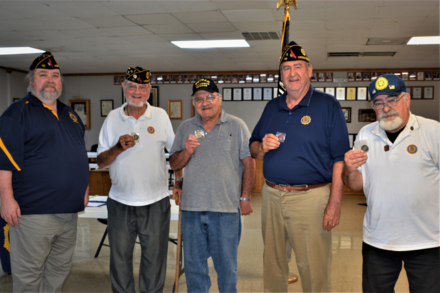 Four American Legion Post 110 Legionnaires were                              awarded with an American Legion Coin for their                              volunteer hours in support of military veterans.                              Making the presentations, at the August 23, 2021                              meeting in Virginia Beach, VA., was Post                              Commander Rick Jones. They accumulated a combined                              total of 750 volunteer hours from July 2020 to                              June 2021 while complying with COVID-19 pandemic                              restrictions. In the photo (left to right) are                              Commander Jones, Chaplain George Schmidt (137                              hours), Finance Officer Bob Russell (156 hours),                              Adjutant Fred Kinkin (225 hours), and Sgt at Arms                              Jeff Kocab (232 hours). (Photography by Bert                              Wendell, Jr.)
