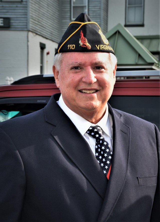 American Legion Post 110 Legionnaire Ron Basso prepares to march in the parade (Photography by Bert Wendell, Jr.)