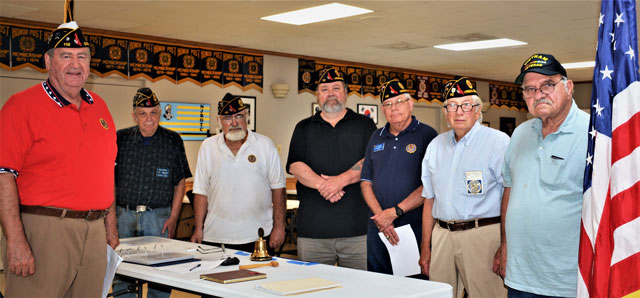 SSgt Robert C. Melberg, USA, American Legion Post 110 held a swearing in ceremony for its 2022-2023 officers on June 22, 2022 in Virginia Beach, VA.  Conducting the ceremony was Virginia Department, 2nd District Commander Fred Kinkin.  In the photo (left to right) are Commander Fred Kinkin, Sgt at Arms Mark McMillan, Sgt at Arms Jeff Kocab, Post 110 Commander Rick Jones, Chaplain Dave Smith, Historian Bert Wendell, Jr., and Finance Officer Bob Russell.  Absent from the photo are Adjutant Ron Basso and Service Officer Eric Bell.  (Photography by George Schmidt, Chaplain Emeritus)